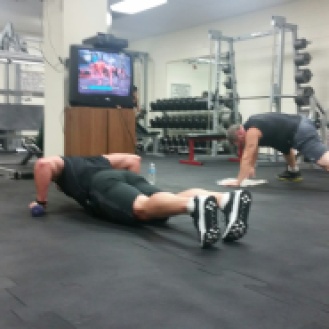 Two men doing push ups